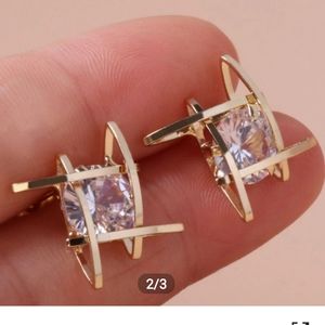 1 pair gold tone and Zircon earrings.- I bundle!